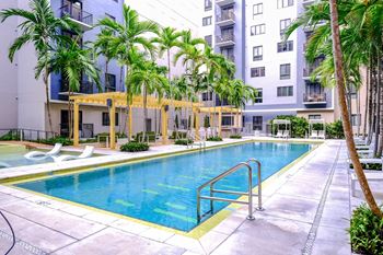 resort-inspired swimming pool at Berkshire Coral Gables apartments